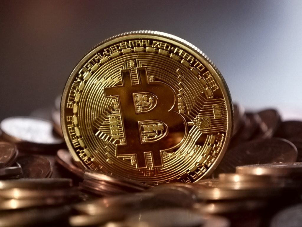 Bitcoin’s price could deflate below $30,000 in 2022, Invesco says
