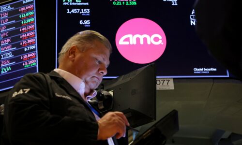 AMC shares slide 20% after theater chain announces plan to sell additional stock