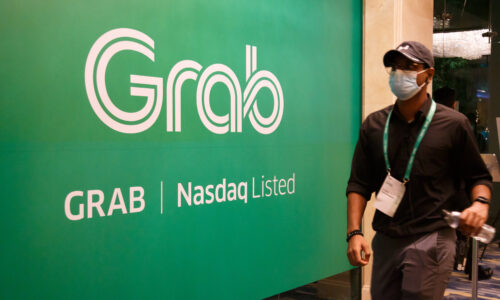 Ride-hailing giant Grab posts first profitable quarter, announces $500 million share buyback