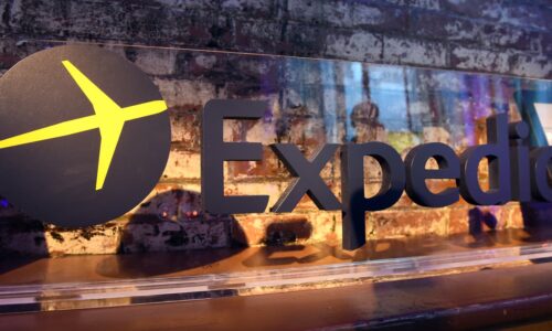 Expedia to cut about 1,500 jobs